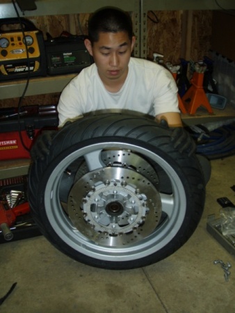 Front wheel with new rotors bolted on.